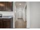 Hallway with tiled floors leads to the front door at 17127 Harvest Moon Way, Bradenton, FL 34211