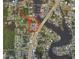 Aerial view highlighting the parcel for potential redevelopment, close to a waterway, along U.S. Highway 19 at 5141 Mallet Dr, Port Richey, FL 34668