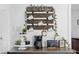 Coffee bar includes coffee maker, tiered serving tray, and decorative wall art at 5141 Mallet Dr, Port Richey, FL 34668