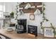 Coffee bar includes coffee maker, tiered serving tray, and decorative wall art at 5141 Mallet Dr, Port Richey, FL 34668