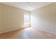 A simply designed bedroom with a window providing natural light and a serene atmosphere at 7814 34Th E Ct, Sarasota, FL 34243