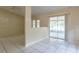 Open dining area with access to the patio through sliding glass doors at 7814 34Th E Ct, Sarasota, FL 34243