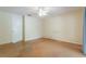 Vacant room with a ceiling fan, ready for personalization and creative design ideas at 7814 34Th E Ct, Sarasota, FL 34243