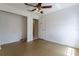 Bare room with a closet and a door, offering flexible use for different purposes at 7814 34Th E Ct, Sarasota, FL 34243