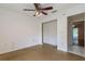 Empty room with ceiling fan, showcasing the potential for customization and design at 7814 34Th E Ct, Sarasota, FL 34243