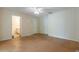 Unfurnished room featuring multiple doors, providing convenient access and layout options at 7814 34Th E Ct, Sarasota, FL 34243