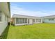 Well-maintained backyard with green grass, ideal for outdoor activities and relaxation at 11923 Boynton Ln # B, New Port Richey, FL 34654