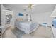 Comfortable bedroom with neutral walls, double closets, and tile flooring at 11923 Boynton Ln # B, New Port Richey, FL 34654