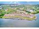 Waterfront condo community with private boat docks and lush surroundings at 150 Brent Cir, Oldsmar, FL 34677