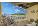 Relaxing covered patio with a waterfront view, perfect for outdoor enjoyment at 150 Brent Cir, Oldsmar, FL 34677