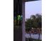 Cozy backyard with ambient lighting near the lake creating an inviting and serene atmosphere at 5150 San Palermo Dr, Bradenton, FL 34208