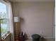 Bright bedroom with a large window overlooking a lush, green outdoor landscape at 5150 San Palermo Dr, Bradenton, FL 34208