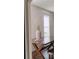 Cozy dining room detail with decorative vase and flowers next to the window at 5150 San Palermo Dr, Bradenton, FL 34208