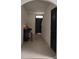 Hallway with piano and decor leading to front door at 5150 San Palermo Dr, Bradenton, FL 34208