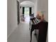 Hallway view of the living room at 5150 San Palermo Dr, Bradenton, FL 34208