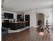 Modern eat-in kitchen with an island bar and black cabinets at 5150 San Palermo Dr, Bradenton, FL 34208