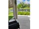 Cozy back patio with lake view, perfect for relaxing and enjoying the serene water view at 5150 San Palermo Dr, Bradenton, FL 34208