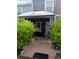 Cozy back patio with stone pavers, privacy landscaping, and a covered gazebo at 6640 121St Ave # 1, Largo, FL 33773