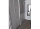 Hallway with closet and mirror door at 6640 121St Ave # 1, Largo, FL 33773