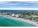 Beautiful aerial shot of the coastline with a mix of residential buildings, beaches, and waterways at 811 Laguna Dr, Venice, FL 34285