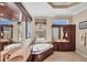 Spacious bathroom with a soaking tub, dual sinks, and stylish decor at 811 Laguna Dr, Venice, FL 34285