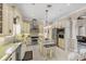 Bright and airy kitchen with stainless appliances and center island at 811 Laguna Dr, Venice, FL 34285