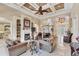 Comfortable living room with fireplace and plenty of seating at 811 Laguna Dr, Venice, FL 34285
