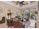 Bright and airy living room featuring a fireplace, access to the patio, and elegant furnishings at 811 Laguna Dr, Venice, FL 34285