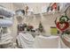 Well-organized storage closet with shelves and room for household items at 811 Laguna Dr, Venice, FL 34285