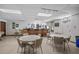 Community bar area with stools, tables, and stylish decor at 9860 62Nd N Ter # 1047, St Petersburg, FL 33708
