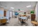 Spacious rec room with multiple tables, comfortable seating, and ample natural light at 9860 62Nd N Ter # 1047, St Petersburg, FL 33708