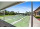 Community shuffleboard courts with ample seating and shaded areas at 9860 62Nd N Ter # 1047, St Petersburg, FL 33708