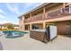 Outdoor space featuring a pool, hot tub, and covered patio, perfect for relaxation and entertaining at 15340 Alsask Cir, Port Charlotte, FL 33981