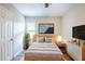 Cozy bedroom featuring stylish furnishings, a comfortable bed, and modern decor accents at 1769 Dayton S St, St Petersburg, FL 33712