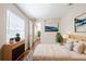 Relaxing bedroom with natural light, a comfortable bed, and tasteful decor at 1769 Dayton S St, St Petersburg, FL 33712