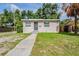 Charming single-story home with a well-maintained lawn and inviting front entrance at 1769 Dayton S St, St Petersburg, FL 33712