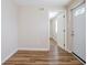 Bright living room features wood-look floors and white trim with ample natural light at 1769 Dayton S St, St Petersburg, FL 33712