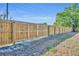 New wood fence providing privacy and security for the backyard, enhancing the property's appeal and boundaries at 2601 Bridle Dr, Plant City, FL 33566