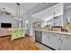 Eat-in kitchen with stainless appliances and a charming green center island at 2601 Bridle Dr, Plant City, FL 33566