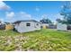 The backyard features a fenced yard with room to roam and a storage shed at 4432 W Wallace Ave, Tampa, FL 33611