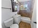 Bathroom featuring modern fixtures, vanity storage, tiled walls, and a shower-tub combination at 4432 W Wallace Ave, Tampa, FL 33611