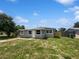 Charming single-story home with a well-maintained yard and ample natural light at 4432 W Wallace Ave, Tampa, FL 33611