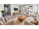 Comfortable living room with neutral color palette and natural light, perfect for relaxing or entertaining guests at 4432 W Wallace Ave, Tampa, FL 33611