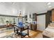 Well-appointed kitchen with an island and views to an eat-in dining area at 8407 Interbay Blvd, Tampa, FL 33616