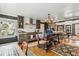Modern kitchen with an island and adjacent dining space at 8407 Interbay Blvd, Tampa, FL 33616