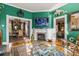 Inviting living room with a fireplace and an open view to the dining room, perfect for entertaining at 8407 Interbay Blvd, Tampa, FL 33616