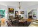 Elegant living room featuring hardwood floors, decorative fireplace, and classic furnishings at 8407 Interbay Blvd, Tampa, FL 33616