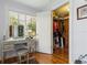 Vanity area with lighted mirror next to closet at 8407 Interbay Blvd, Tampa, FL 33616