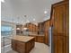 Gourmet kitchen featuring granite countertops, custom cabinetry and stainless steel appliances at 11356 Callaway Pond Dr, Riverview, FL 33579