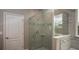 Modern bathroom showcasing a glass-enclosed shower with stylish tile accents at 11456 Libby Rd, Spring Hill, FL 34609